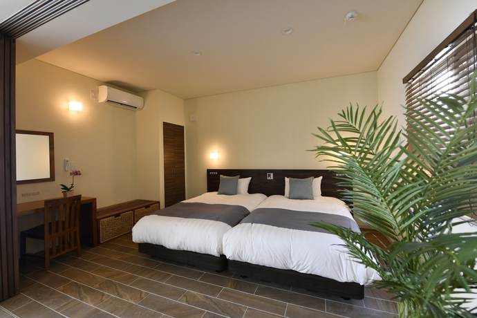 Imagen de la habitación del Hotel Feliz Villa Suite Miyakojima Ueno. Foto 10