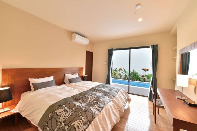 Imagen de la habitación del Hotel Feliz Villa Suite Miyakojima Ueno. Foto 13