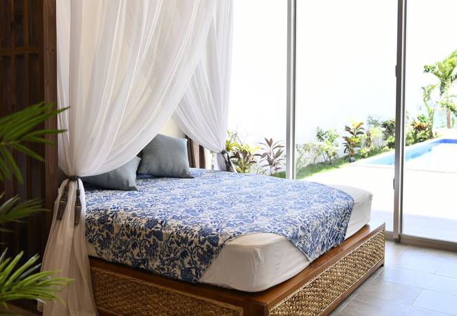 Imagen de la habitación del Hotel Feliz Villa Suite Miyakojima Ueno. Foto 17
