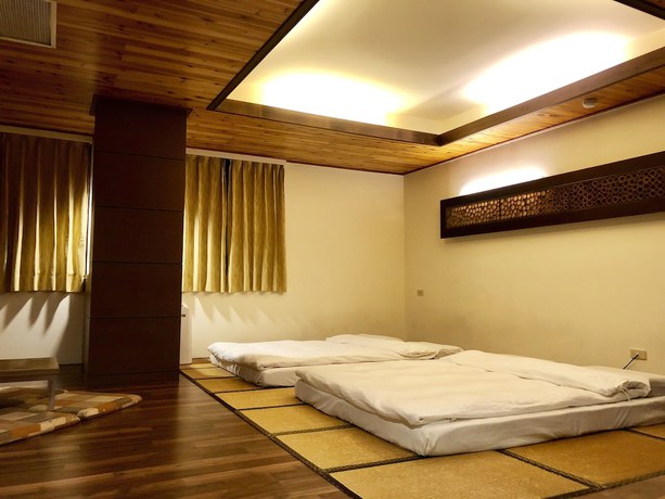 Imagen de la habitación del Hotel Fenchihu. Foto 11