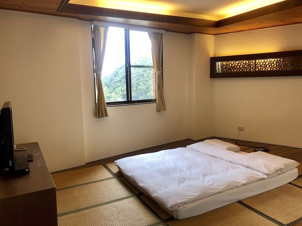 Imagen de la habitación del Hotel Fenchihu. Foto 14