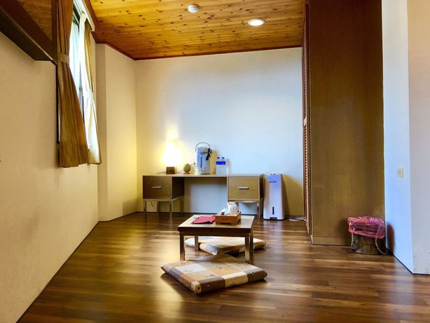 Imagen de la habitación del Hotel Fenchihu. Foto 17