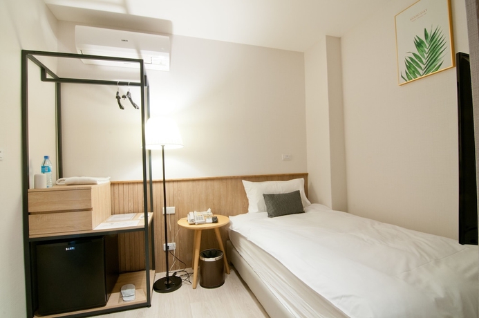 Imagen de la habitación del Hotel Feng Chi Inn. Foto 4