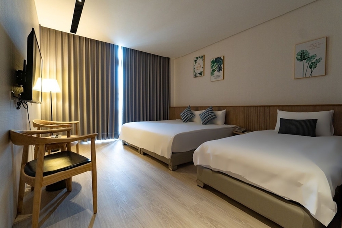 Imagen de la habitación del Hotel Feng Chi Inn. Foto 8