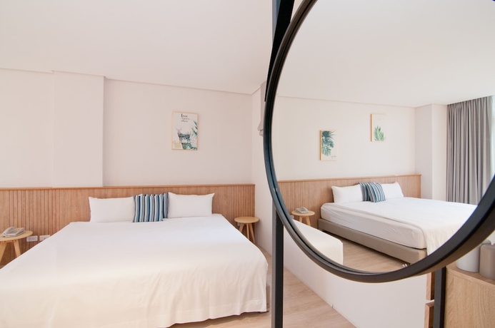 Imagen de la habitación del Hotel Feng Chi Inn. Foto 12