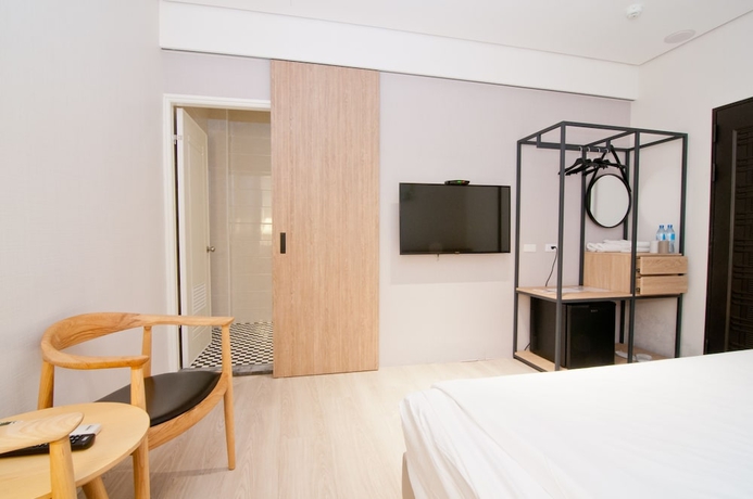 Imagen de la habitación del Hotel Feng Chi Inn. Foto 13