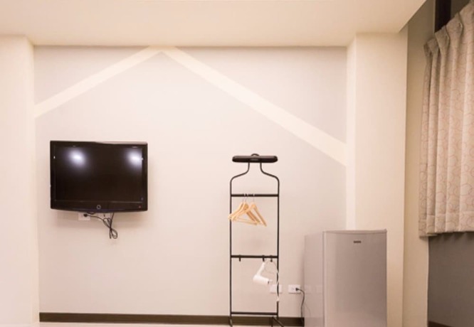Imagen de la habitación del Hotel Feng Chia Dream Land. Foto 5
