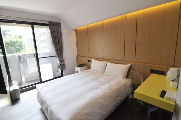 Imagen de la habitación del Hotel Feng Jia 25. Foto 20