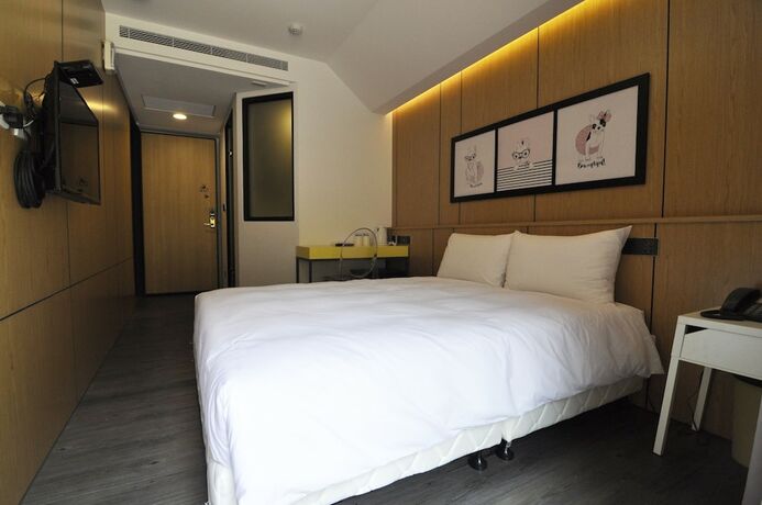 Imagen de la habitación del Hotel Feng Jia 25. Foto 24