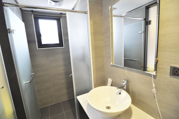 Imagen de la habitación del Hotel Feng Jia 25. Foto 28