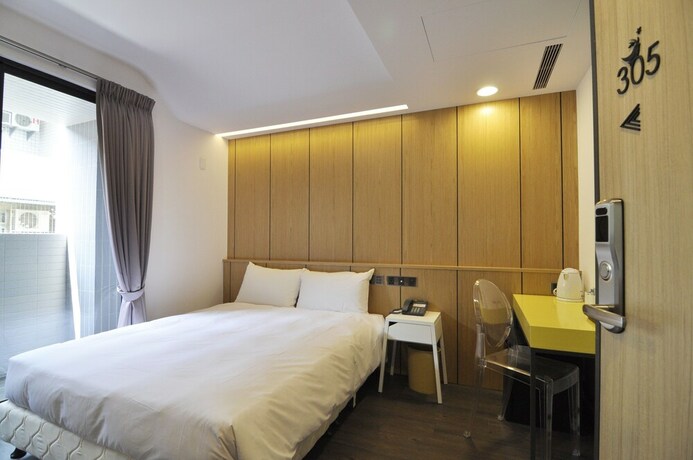 Imagen de la habitación del Hotel Feng Jia 25. Foto 30