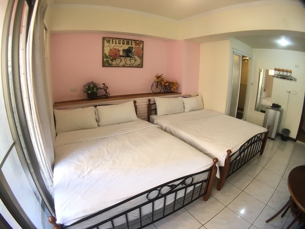 Imagen de la habitación del Hotel Fengchia Sandiego. Foto 16