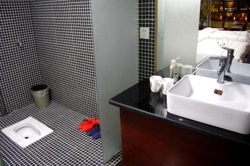 Imagen general del Hotel Fenghuang 1st Apartment. Foto 2