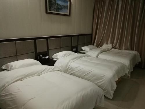 Imagen de la habitación del Hotel Fenghuang Fengyuxuan Boutique Guesthouse ( Fenghua. Foto 7