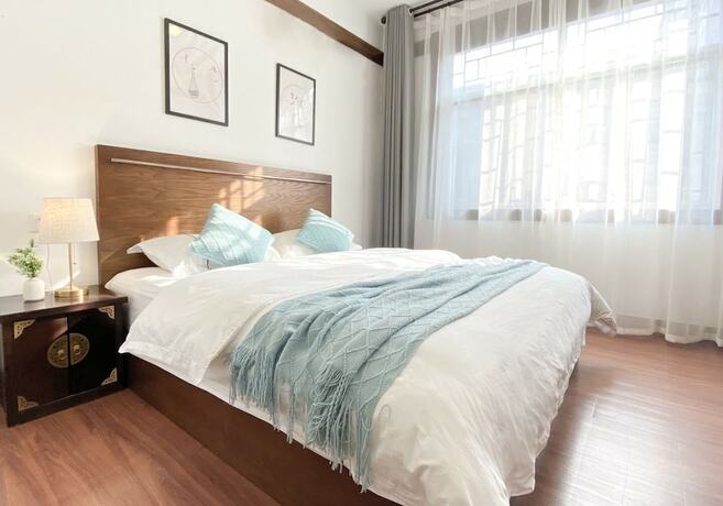 Imagen de la habitación del Hotel Fenghuang Hemu House. Foto 16