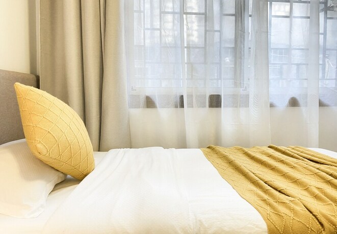 Imagen de la habitación del Hotel Fenghuang Hemu House. Foto 22