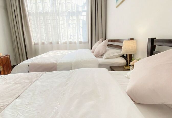 Imagen de la habitación del Hotel Fenghuang Hemu House. Foto 23