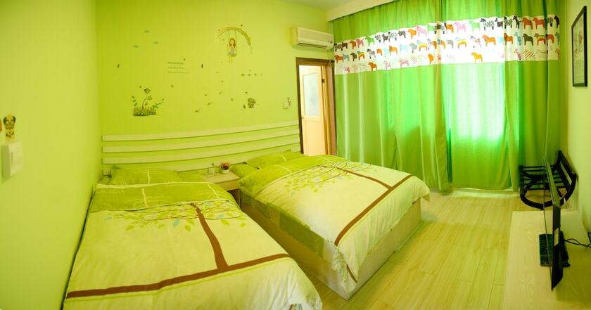 Imagen de la habitación del Hotel Fenghuang Hua Xiang Yuan Inn. Foto 13