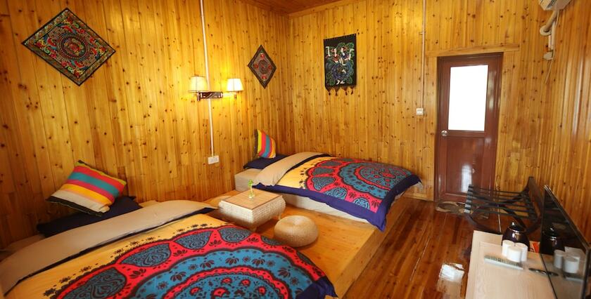 Imagen de la habitación del Hotel Fenghuang Hua Xiang Yuan Inn. Foto 16