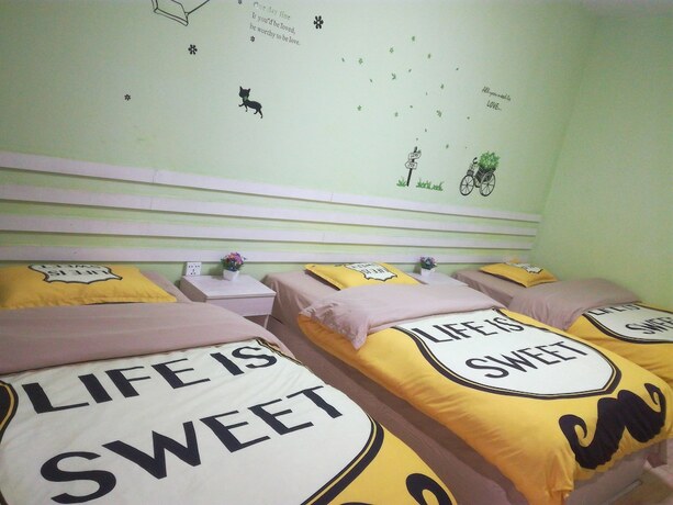 Imagen de la habitación del Hotel Fenghuang Hua Xiang Yuan Inn. Foto 17