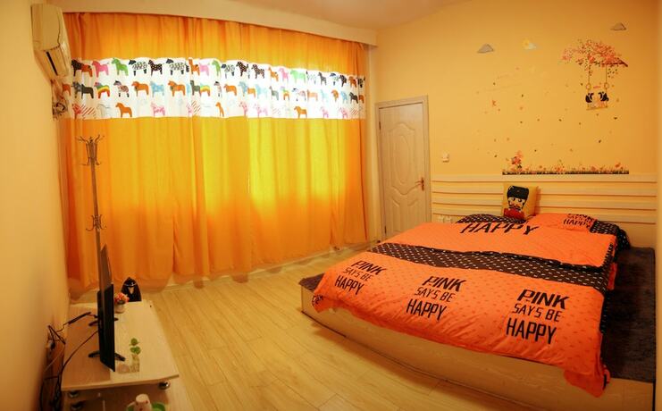 Imagen de la habitación del Hotel Fenghuang Hua Xiang Yuan Inn. Foto 18