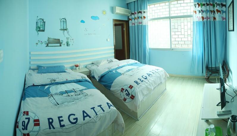 Imagen de la habitación del Hotel Fenghuang Hua Xiang Yuan Inn. Foto 19