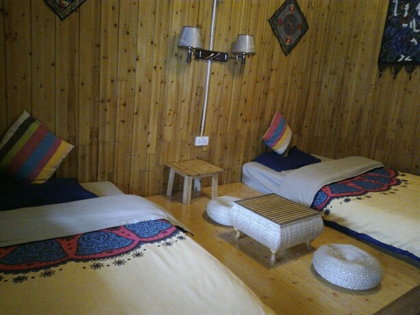 Imagen general del Hotel Fenghuang Hua Xiang Yuan Inn. Foto 8