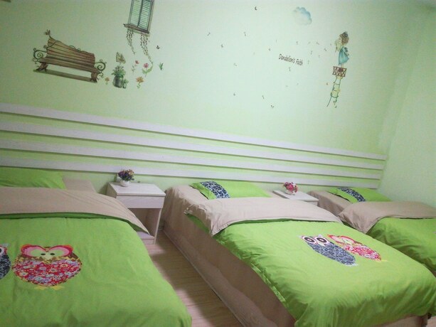 Imagen de la habitación del Hotel Fenghuang Hua Xiang Yuan Inn. Foto 20