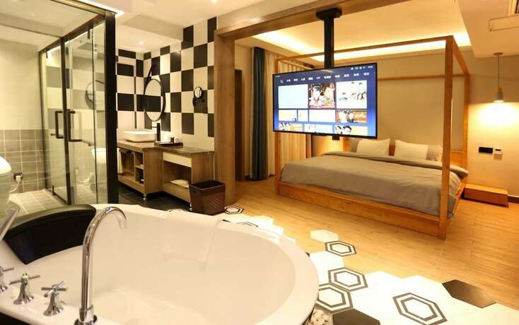 Imagen de la habitación del Hotel Fenghuang Waiting For You Guest House. Foto 7