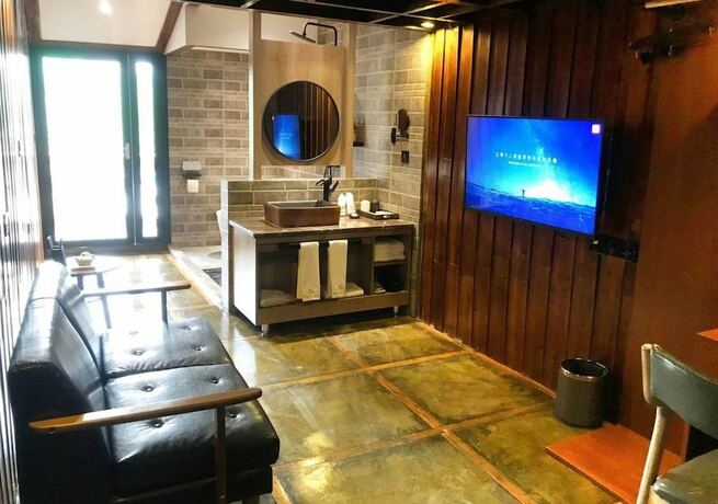 Imagen de la habitación del Hotel Fenghuang Waiting For You Guest House. Foto 8