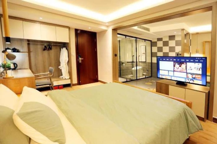 Imagen de la habitación del Hotel Fenghuang Waiting For You Guest House. Foto 10
