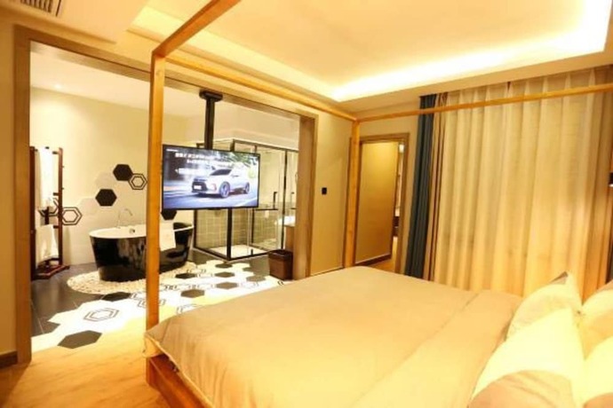 Imagen de la habitación del Hotel Fenghuang Waiting For You Guest House. Foto 13