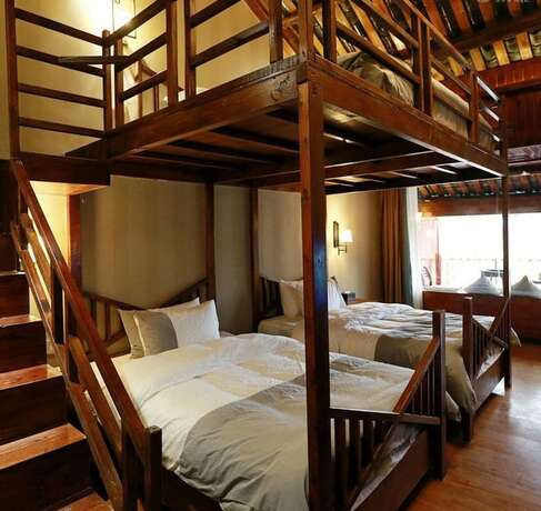 Imagen de la habitación del Hotel Fenghuang Waiting For You Luxe Living. Foto 11