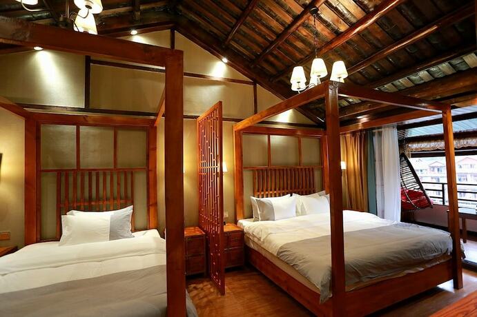 Imagen de la habitación del Hotel Fenghuang Waiting For You Luxe Living. Foto 12