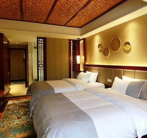 Imagen de la habitación del Hotel Fenghuang Waiting For You Luxe Living. Foto 15