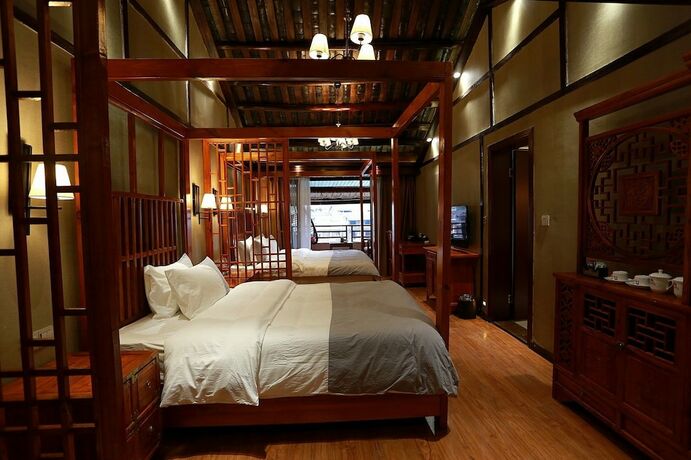 Imagen de la habitación del Hotel Fenghuang Waiting For You Luxe Living. Foto 17