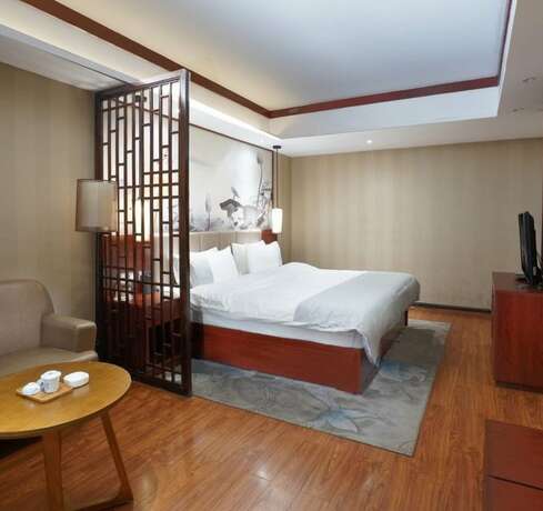 Imagen de la habitación del Hotel Fenghuang Waiting For You Luxe Living. Foto 18