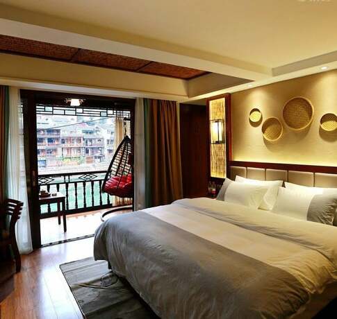 Imagen de la habitación del Hotel Fenghuang Waiting For You Luxe Living. Foto 21