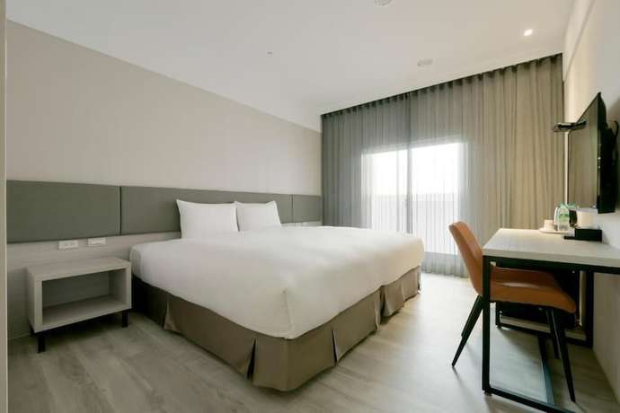 Imagen de la habitación del Hotel Fengjia Gold. Foto 2