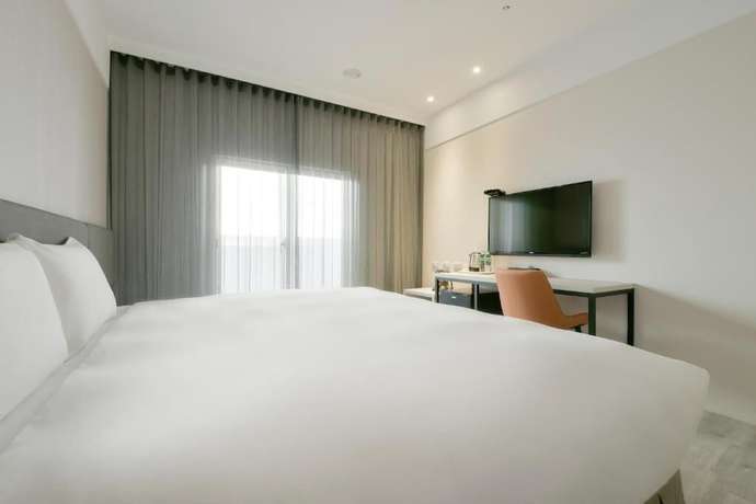 Imagen de la habitación del Hotel Fengjia Gold. Foto 3