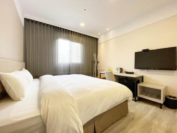 Imagen de la habitación del Hotel Fengjia Gold. Foto 9
