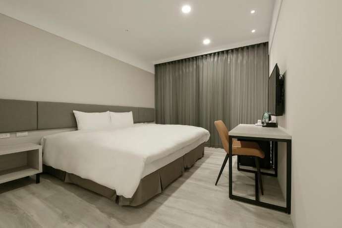 Imagen de la habitación del Hotel Fengjia Gold. Foto 17