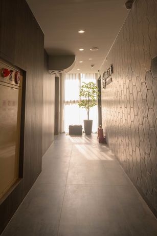 Imagen de los interiores del Hotel Fengjia K. Foto 13