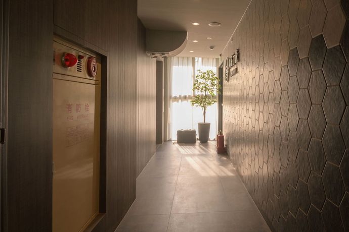 Imagen de los interiores del Hotel Fengjia K. Foto 14