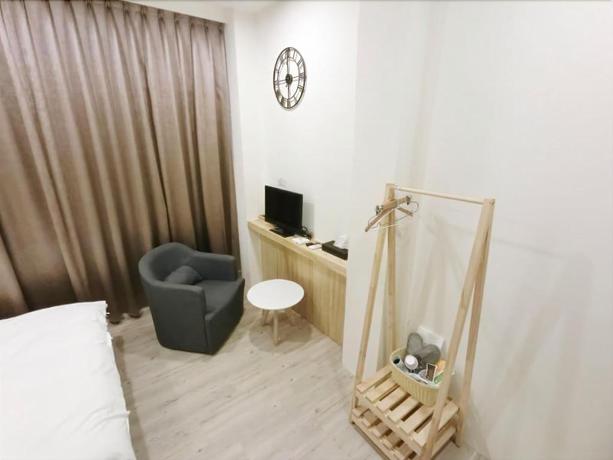 Imagen de la habitación del Hotel Fengjia Line Stack. Foto 11