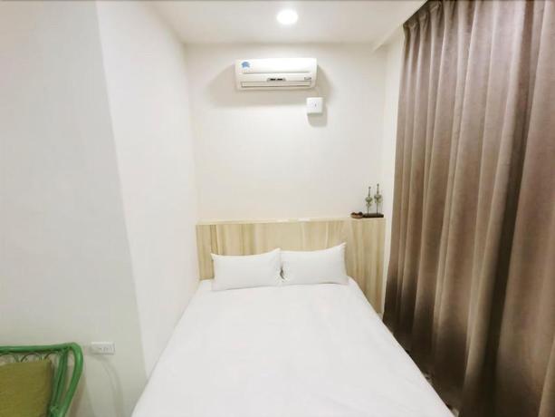 Imagen de la habitación del Hotel Fengjia Line Stack. Foto 12