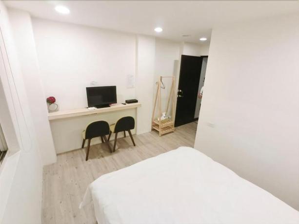 Imagen de la habitación del Hotel Fengjia Line Stack. Foto 15