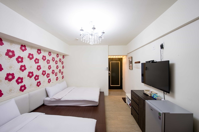 Imagen de la habitación del Hotel Fengjia Pandola. Foto 11