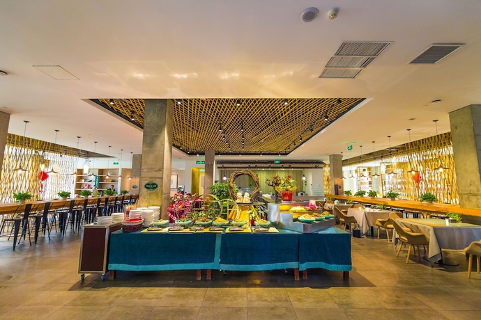 Imagen del bar/restaurante del Hotel Fengxiang Hot Spring. Foto 4