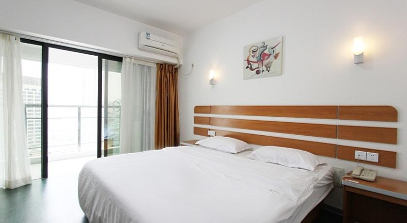 Imagen de la habitación del Hotel Fengyi Hotel. Foto 4